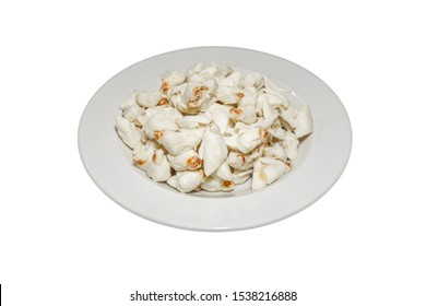 Top View Of Pile Of Fresh Steamed Crab Meat Without Shell And Ready To Eat On White Dish Isolated On White Background.