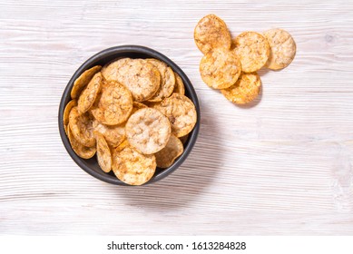 Top View Pile Of Organic, Crispy, Baked, Whole Grain Rice Chips 