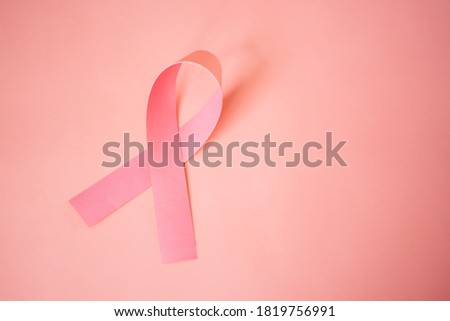 Top view of Pink Ribbon Breast Cancer Awareness with copy space. Healthcare and medicine concept. October Pink day. World Cancer Day.