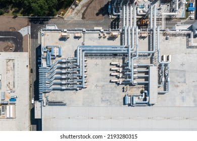 Top View Of The Pipeline System Of A Chemical Plant, Air Purification System On The Roof Of A Building