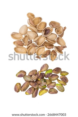 A top view of pistachio shells separated from shelled pistachio nuts. A nutritious vegan snack, pistachios are rich in protein, fiber, and healthy fats, making them a perfect plant-based food.