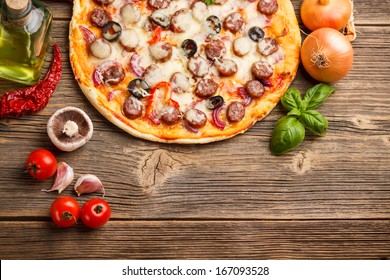 Top View Of Pizza With Ingredients