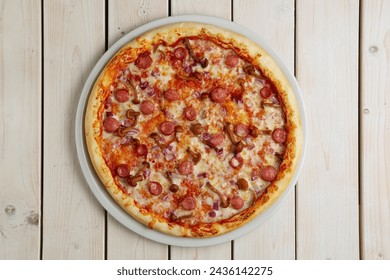 Top view of pizza with sausage and honey agaric - Powered by Shutterstock