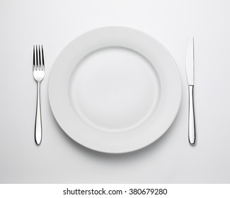 Top View Of Place Setting With Plate, Knife And Fork, With Clipping Path