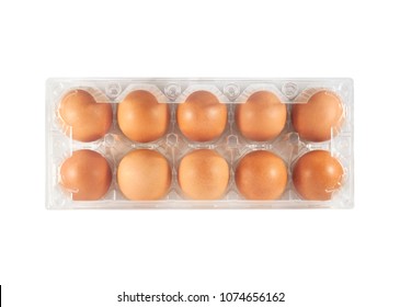 Top view of plastic egg tray with 10 eggs isolated on white