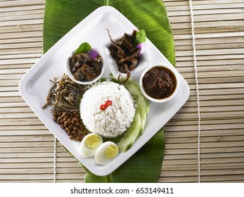 Top View Of A Plate Of Nasi Lemak On Banana Leaf