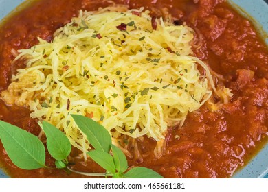 Top View Of Plate With Roasted Spaghetti Squash And Marinara Sauce.