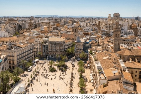 Top view of Plaza de la Reina square in central part of Valencia city, Spain. Valencia cityscape seen from the Bell tower of Valencia Cathedral at sunny day
