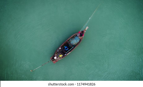Top view point of fisherman keep a local nets in the early morning of Yao Noi island, Phang Nga province, Thailand.
