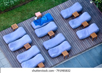 Top View Pool Bed, Beach Chair On Wooden Plank Floor            