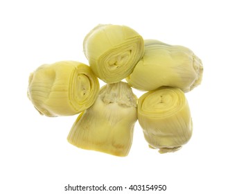 Top view of a portion of canned artichoke hearts isolated on a white background.