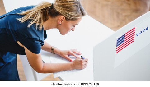 Top View Portrait Of Woman Voter In Polling Place, Usa Elections Concept.