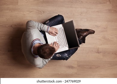 Top View Portrait Of Young Man With Laptop