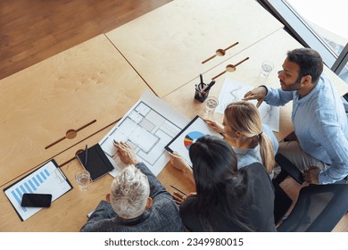 Top view of professional business managers working with project documents in office  - Powered by Shutterstock