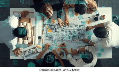 Top view of professional civil architect engineer team write sticky notes and sticking note at house model while interior designer talking and discussing about financial statistic chart. Alimentation. - Powered by Shutterstock