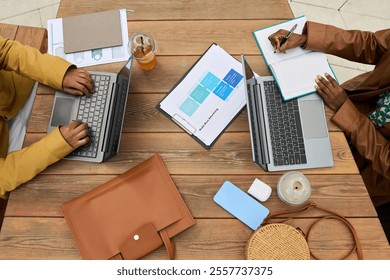 Top View of Professionals Collaborating on Business Project