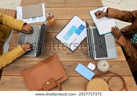 Top View of Professionals Collaborating on Business Project