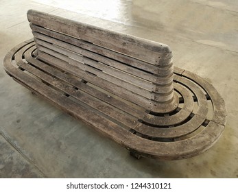 Top View Of A Public Vintage Wooden Seat At The Railway Station.