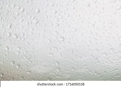 Top View Rain Drop On Bronze Car Bonnet After Rain Fall For Texture Background.