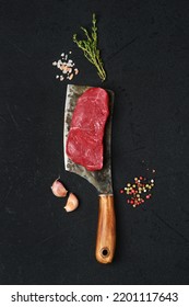 Top View Of Raw Boneless Strip Loin Steak On Cleaver