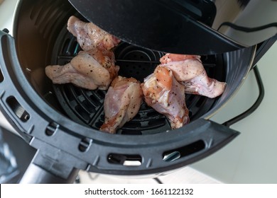 Top View Of Raw Chicken Wings In Oven Air Fryer