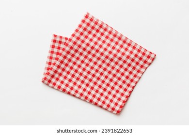 top view with red empty kitchen napkin isolated on table background. Folded cloth for mockup with copy space, Flat lay. Minimal style. - Powered by Shutterstock