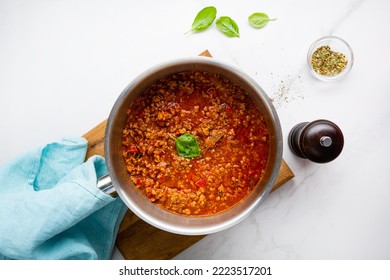 Top View Of Red Meat Sauce In Pan Bolognese On Marble Surface And Spice Italian Food