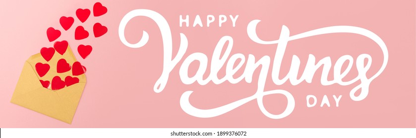 Top View Of Red Paper Hearts And Envelope Near Happy Valentines Day Lettering On Pink Background, Banner