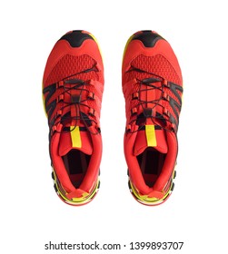 Top View Of Red Trail Running Shoes Isolated On White Background