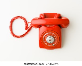 Top View Of Red Vintage Phone On White Background