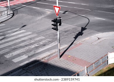 Top view of the road intersection. Traffic lights. crosswalk.