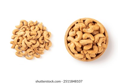 Top view of Roasted cashew nuts in wooden bowl with pile of cashew nuts on white background.