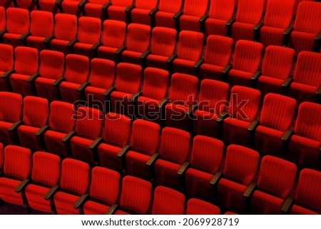 Top view row of empty red seats at theatre cinema