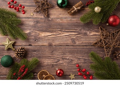 Top view of a rustic wooden table adorned with pine branches, red berries, star decor, and holiday ornaments creating a festive Christmas atmosphere - Powered by Shutterstock