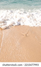 Top View Of Sand Sea And Wave. Holiday Concept With Sea And Sand. Sea Foam And Sand. Holiday Phone Screen Background.