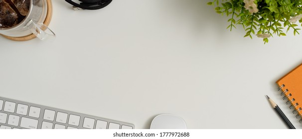 Top View Of Scene Creator With Computer Device, Notebook, Coffee Cup, Decoration And Copy Space