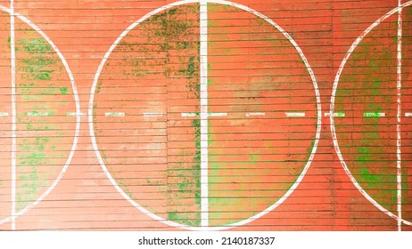 Top View Of The School Gym With Old Wooden Covering And Multi Colored Paints Of The World, Background Image, Empty Space For Your Slogan, Tinting, Vignetting, Selective Focusing