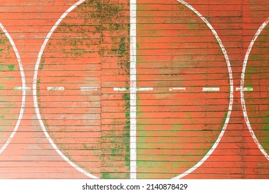 Top View Of The School Gym With Old Wooden Covering And Multi Colored Paints Of The World, Background Image, Empty Space For Your Slogan, Tinting, Vignetting, Selective Focusing