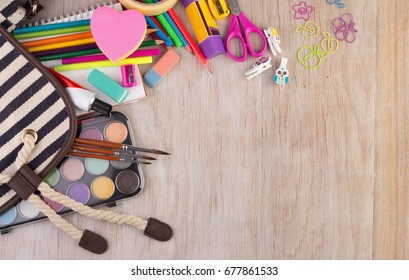 Top View Of School Supplies On Wooden Desk. Place For Your Text