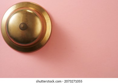 Top View Of  Service Bell On Pink Background