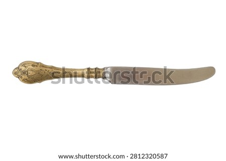 Top view. Serving knife in retro style isolated on white background. Cutlery made of cupronickel. 