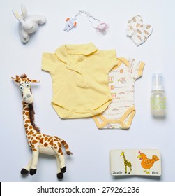 Top View Set Of Fashion Trendy Stuff And Toys For Newborn Baby, Baby Fashion Concept 