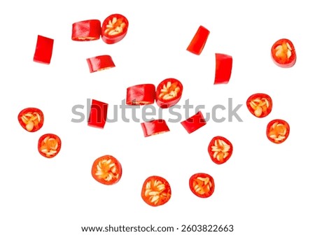 Top view set of fresh red chili pepper or cayenne pepper scattering in slices or pieces is isolated on white background with clipping path