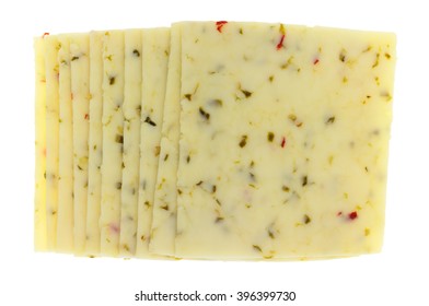 Top View Of Several Slices Of Pepper Jack Cheese Isolated On A White Background.