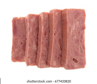 Top View Of Several Thick Slices Of Canned Ham Isolated On A White Background.