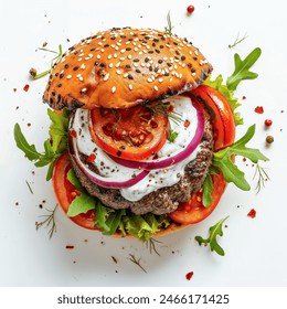 Top view shot of a hamburger bread bun, isolated on white background. The freshly baked, golden brown color and a sprinkling of sesame seeds on top.
