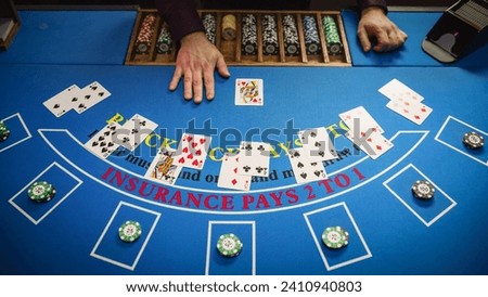 Top View Shot of a Online Casino Card Game Table: Anonymous Game Dealer Masterfully Revealing possible Jackpot Winning Hand. Blackjack Croupier Dealing Playing Cards. Top Down Shot