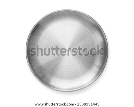 Top view of silver metal plate isolated on white background with clipping path. Empty steel round flat tray with shadow. Flat lay mock up template for food poster design.