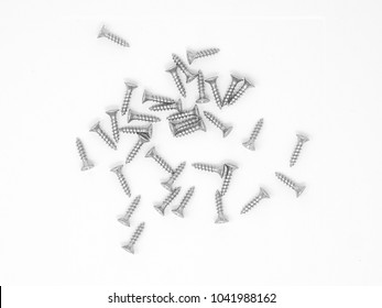 Top view of silver screws isolated on white background