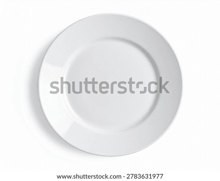 Top view of a simple, empty white ceramic dinner plate isolated on a white background.